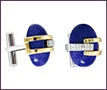Men’s custom 14K white and yellow gold cufflinks with clear diamonds and cabochon sapphires.